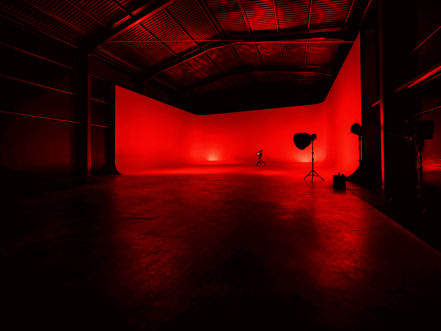 Cave Clan Studios — red lit studio